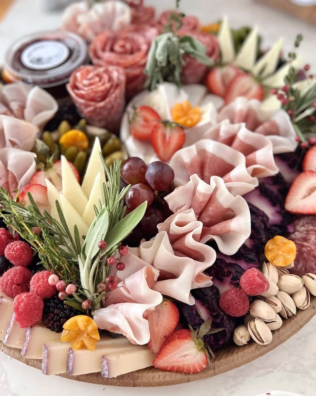 An elegant buffet spread at a catered event with various gourmet dishes