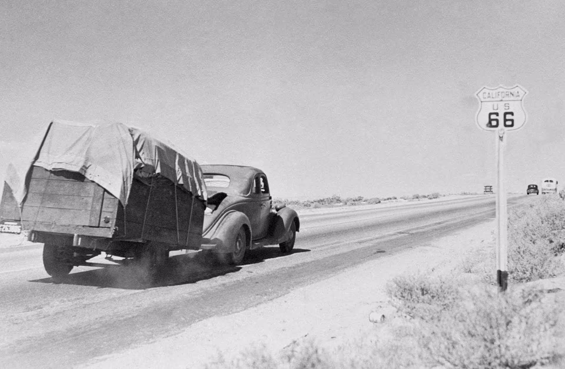1930's car driving down Route 66
