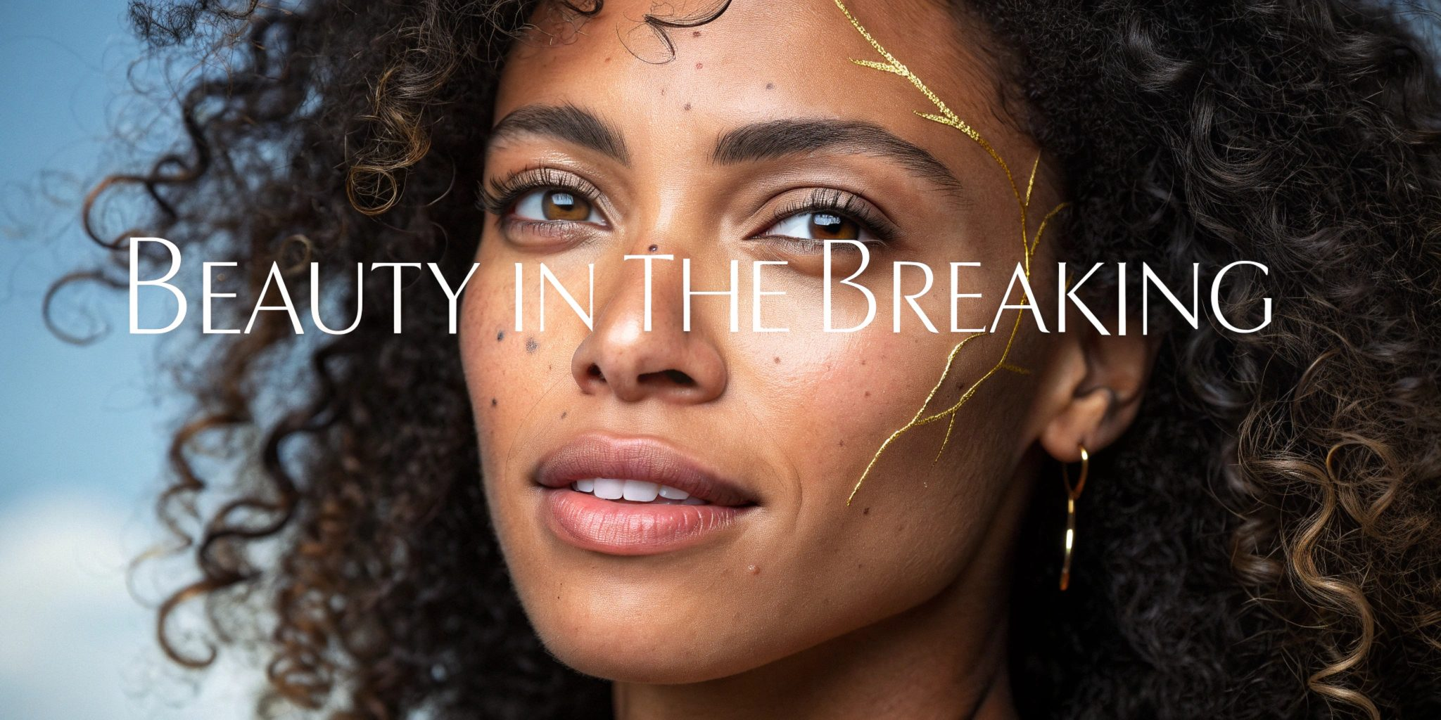 Close-up portrait of a Black woman with natural curly hair and Kintsugi gold leaf accents in cracks on her face, overlaid with text reading 'Beauty in the Breaking