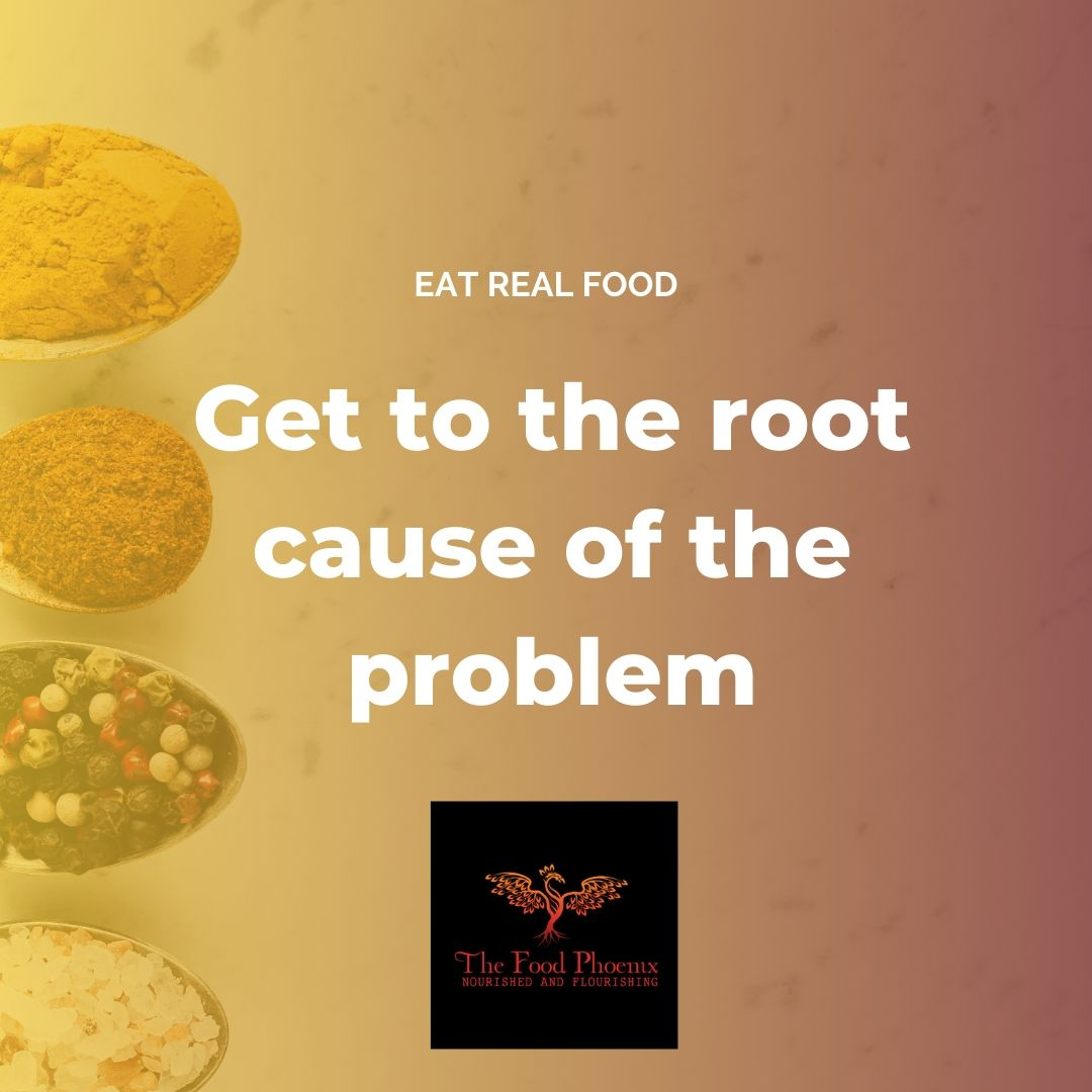 Promotional graphic with a yellow-to-pink gradient and bowls of spices down the left side. Large white text reads 'Get to the root cause of the problem' with 'EAT REAL FOOD' above. At the bottom is The Food Phoenix logo with the tagline 'Nourished and Flourishing.'