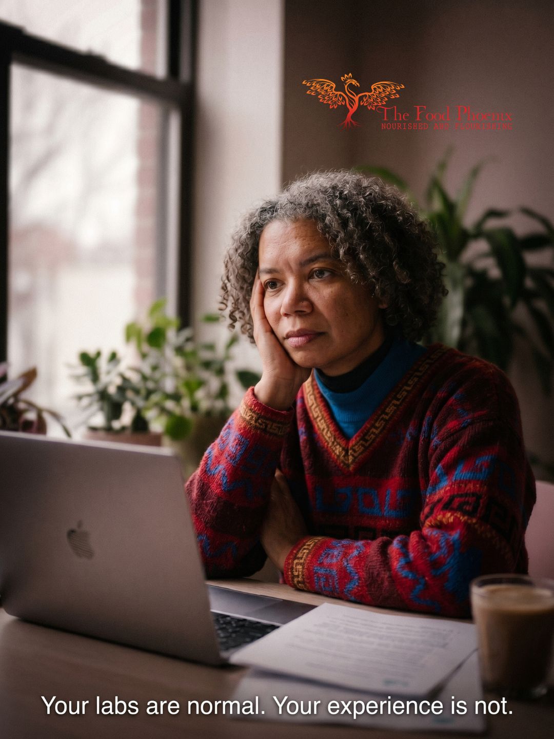 A middle-aged woman sits at a laptop, hand against her cheek, looking quietly exhausted. Overlay: Your labs are normal. Your experience is not.
