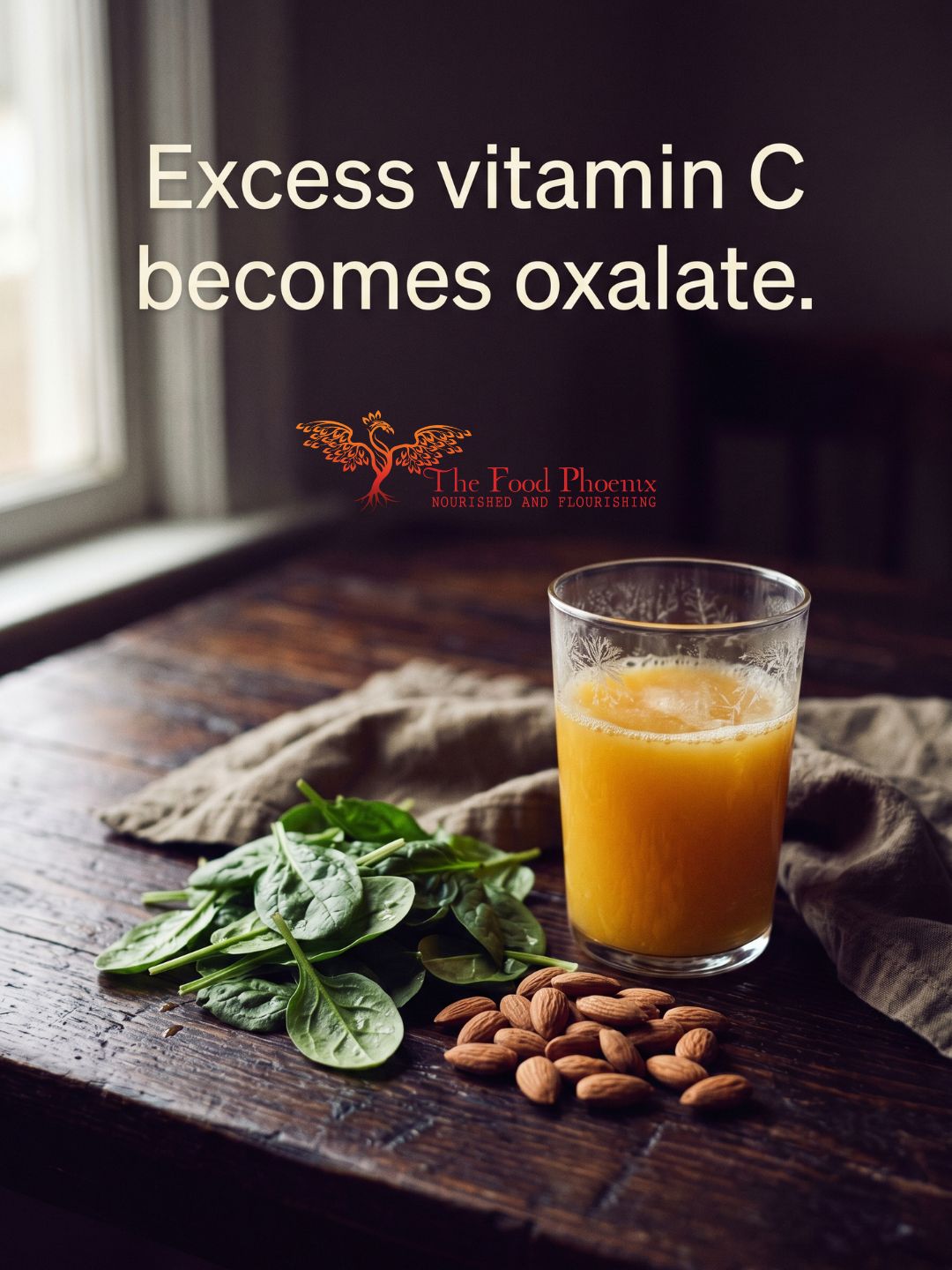 Spinach, almonds and a glass of orange juice on a dark table, dietary oxalate and vitamin C relevant to gadolinium toxicity. Overlay: Excess vitamin C becomes oxalate.