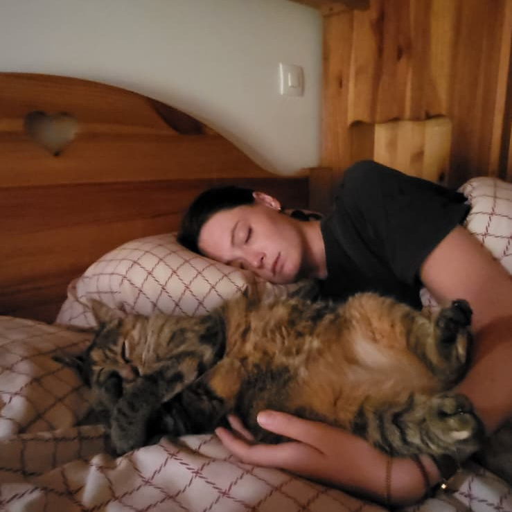 Caro falling asleep with a cat we were house sitting Caro falling asleep with a cat we were house sitting