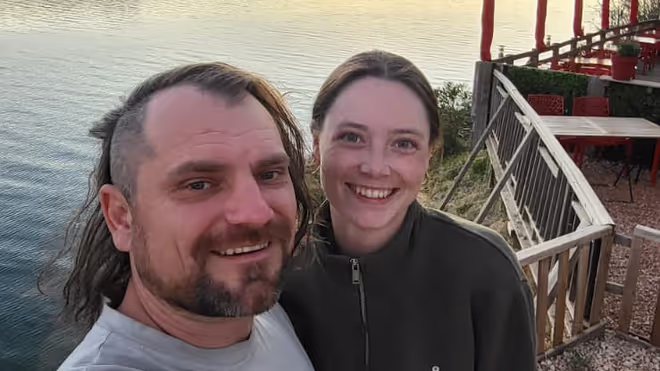 Konrad and Caro by a lake in France Konrad and Caro by a lake in France