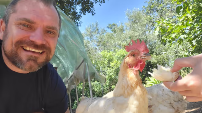Konrad with a chicken
