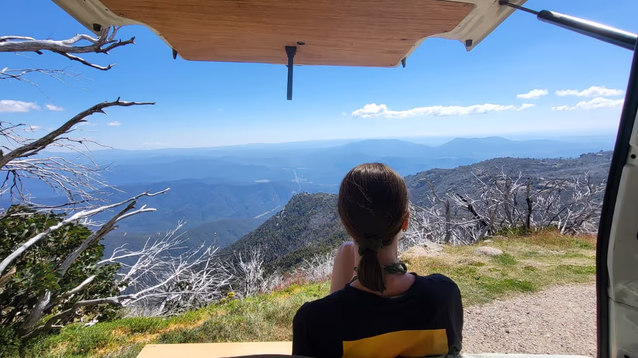 Caro enjoying the view out of our campervan