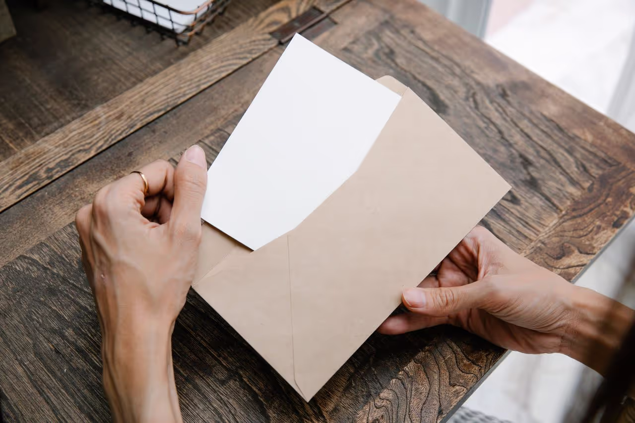 Opening a letter received while traveling