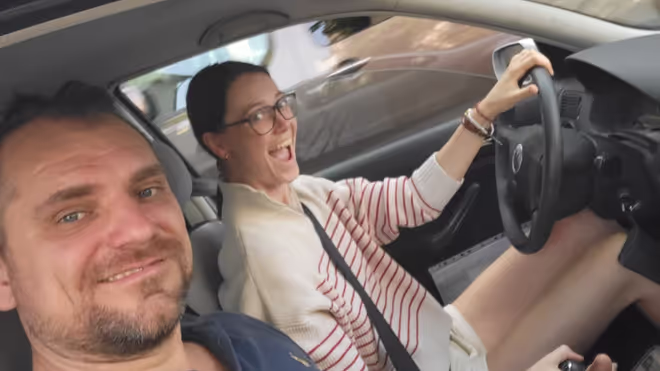 Konrad and Caro in their VW Golf