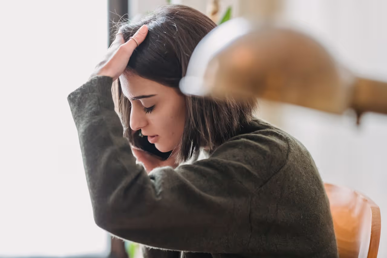 A person on the phone nervous