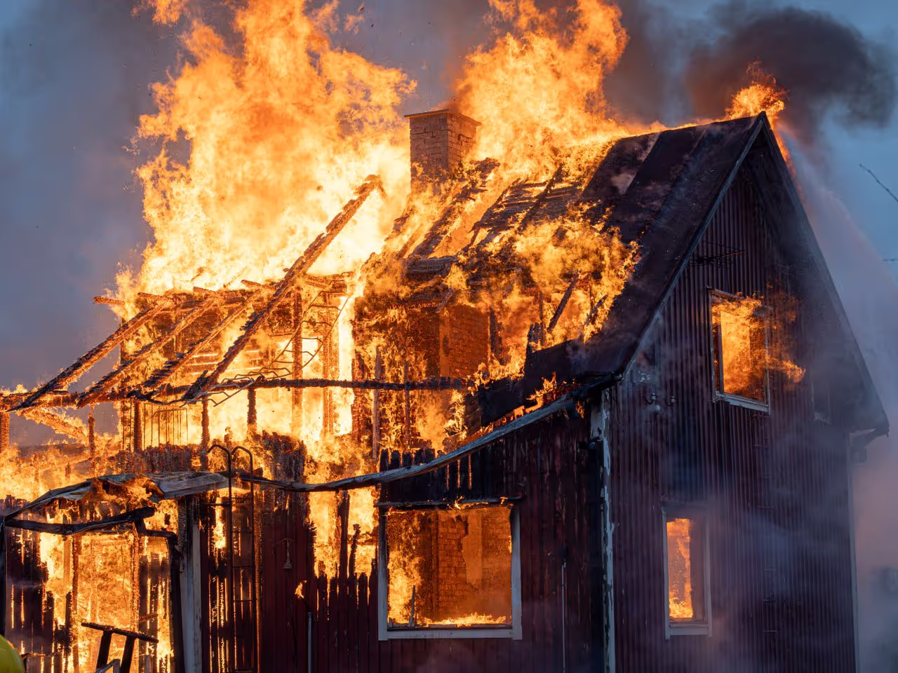 A house burning down A house burning down