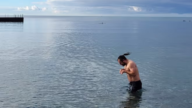 Konrad going for a swim in Italy during winter Konrad going for a swim in Italy during winter