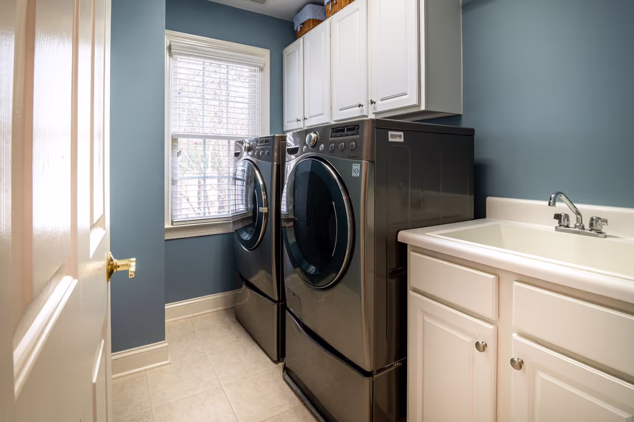 a washer and dryer in a house a washer and dryer in a house