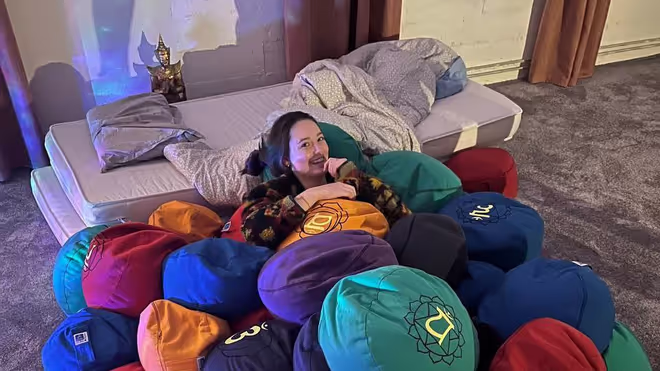 Caro hiding in a bunch of pillows in Iceland Caro hiding in a bunch of pillows in Iceland