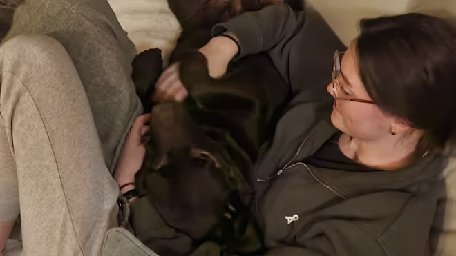 Caro patting the dog Caro patting the dog