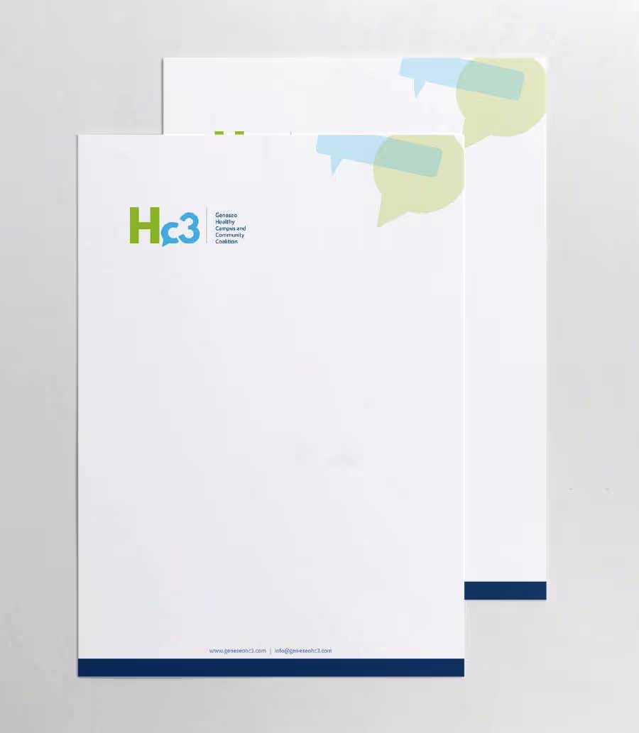 Two pieces of white letterhead paper featuring the green and blue 'Hc3' logo for Geneseo Healthy Communities and Community Coalition in the upper left. The top right of the paper has overlapping light blue and green speech bubble shapes. The bottom of the paper has a dark blue band displaying 'www.geneseohc3.com' and 'info@geneseohc3.com'. The papers are presented on a light gray background.
