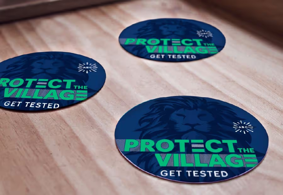 Dark blue Protect the Village coaster with lion